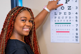 Medical Assistant at Eye Exam Chart